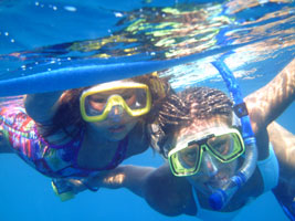 family snorkeling in Hawaii